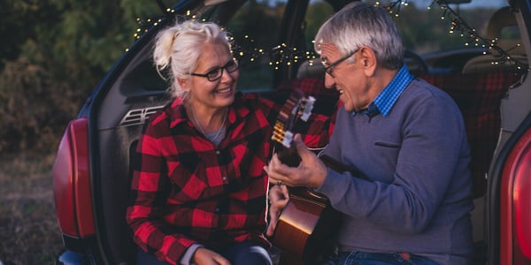 Mature-Couple-Guitar-Outdoors